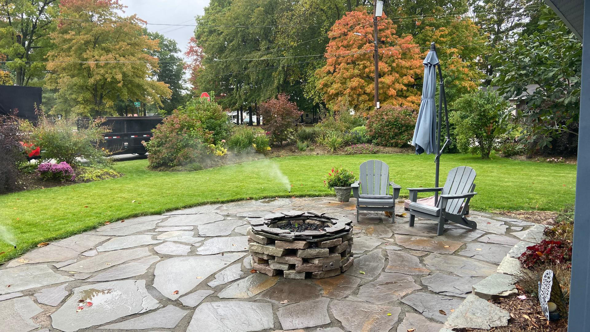 Fire pit and patio outside of a home